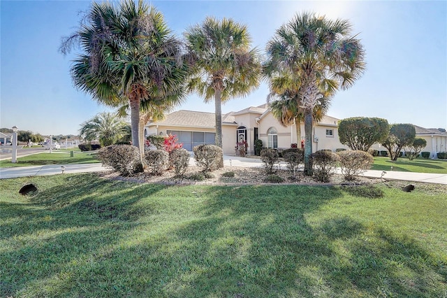 view of front facade with a front yard