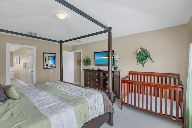 bedroom featuring connected bathroom