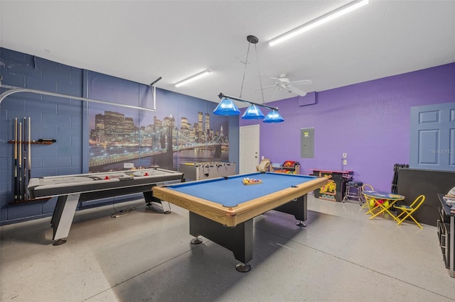 game room featuring electric panel, ceiling fan, and billiards