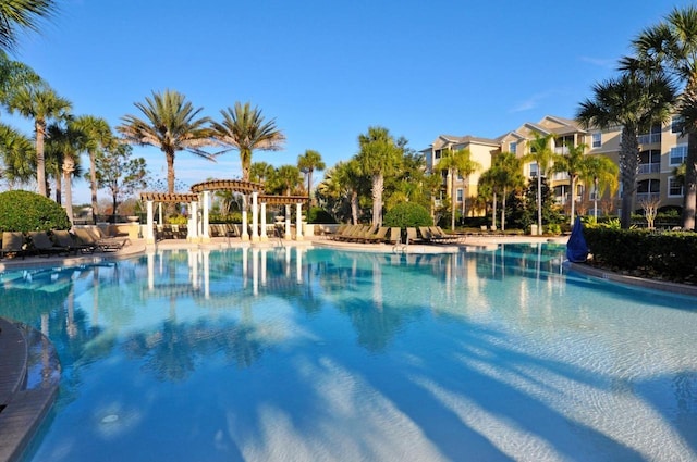 view of swimming pool featuring a pergola