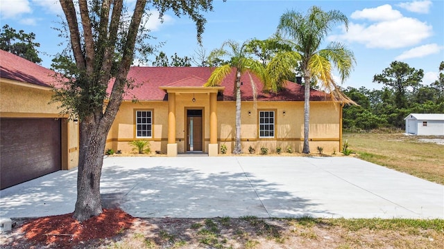 view of front of home featuring a garage