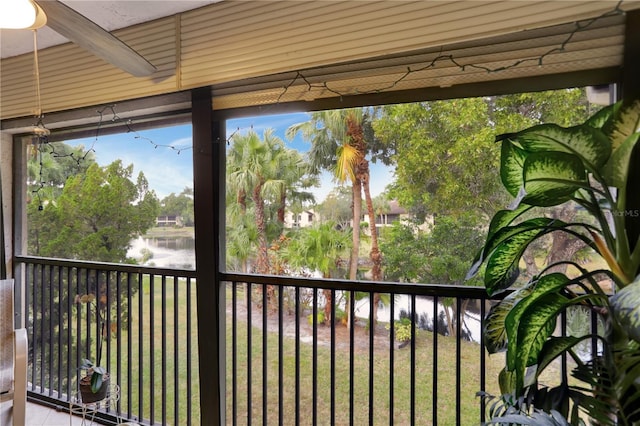 balcony featuring a water view