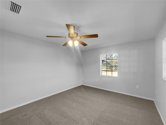 empty room with carpet flooring and ceiling fan