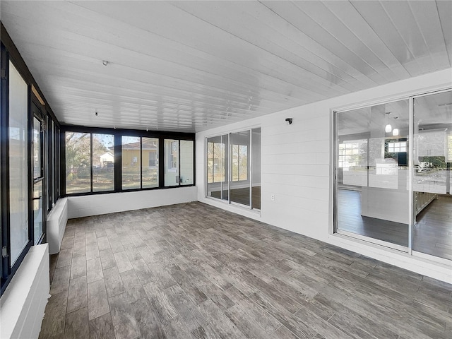 14912 SW 35th Cir, Ocala, FL 34473 - unfurnished sunroom with wood finished floors and plenty of natural light