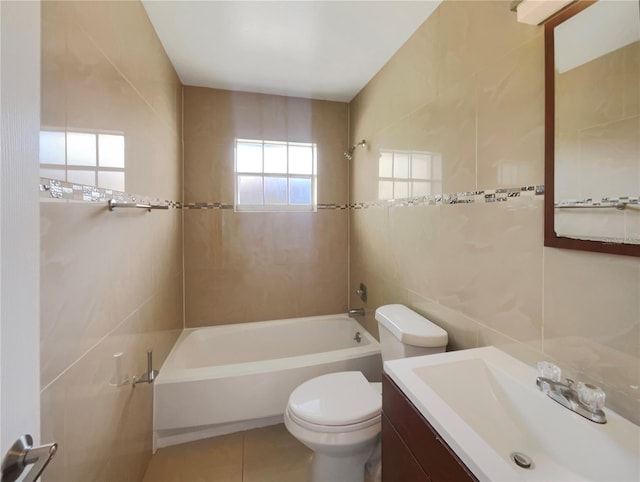 14912 SW 35th Cir, Ocala, FL 34473 - full bathroom with tub / shower combination, vanity, toilet, tile patterned floors, and tile walls