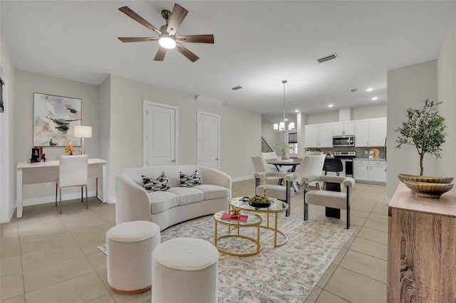 tiled living room with ceiling fan