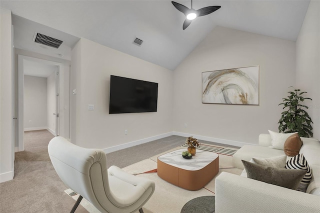 living room featuring ceiling fan, light colored carpet, and lofted ceiling