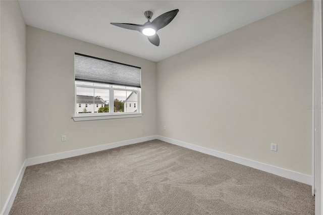 unfurnished room featuring carpet flooring and ceiling fan