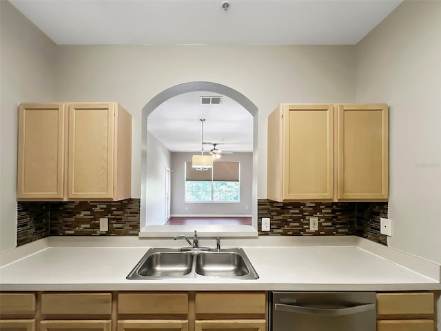 13536 Turtle Marsh Loop Unit 538, Orlando, FL 32837 - kitchen featuring a sink, light brown cabinetry, and stainless steel dishwasher