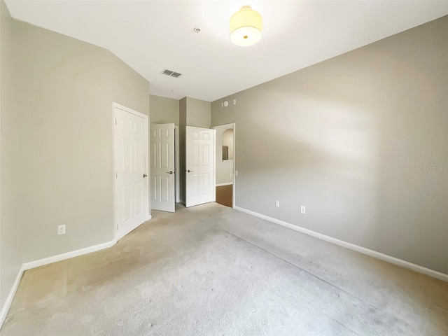 13536 Turtle Marsh Loop Unit 538, Orlando, FL 32837 - unfurnished bedroom featuring baseboards, carpet, and a closet