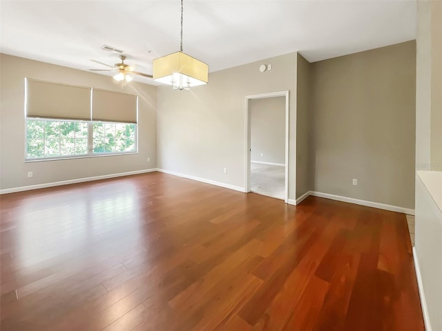 13536 Turtle Marsh Loop Unit 538, Orlando, FL 32837 - unfurnished room featuring a ceiling fan, wood finished floors, and baseboards