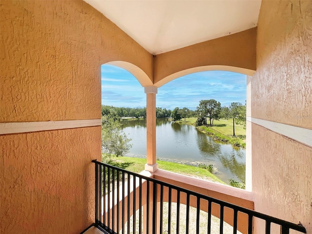 13536 Turtle Marsh Loop Unit 538, Orlando, FL 32837 - balcony with a water view and view of wooded area