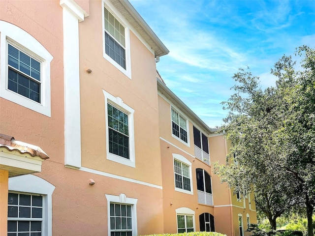 13536 Turtle Marsh Loop Unit 538, Orlando, FL 32837 - view of property exterior with stucco siding