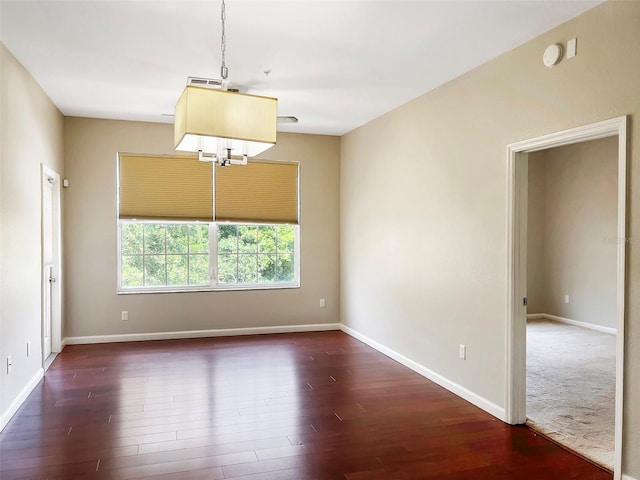 13536 Turtle Marsh Loop Unit 538, Orlando, FL 32837 - unfurnished room with dark wood-style floors, baseboards, and a smoke detector