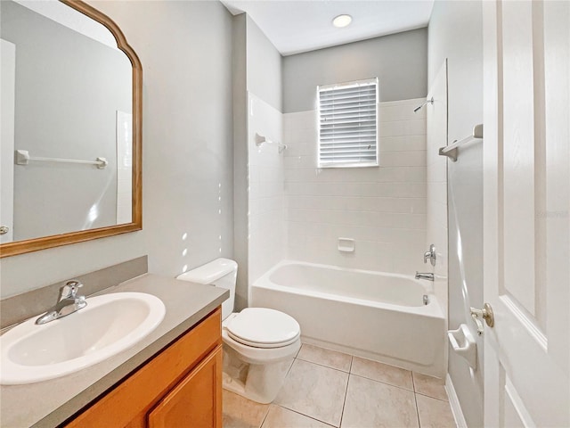 full bathroom with tile patterned floors, vanity, toilet, and tiled shower / bath