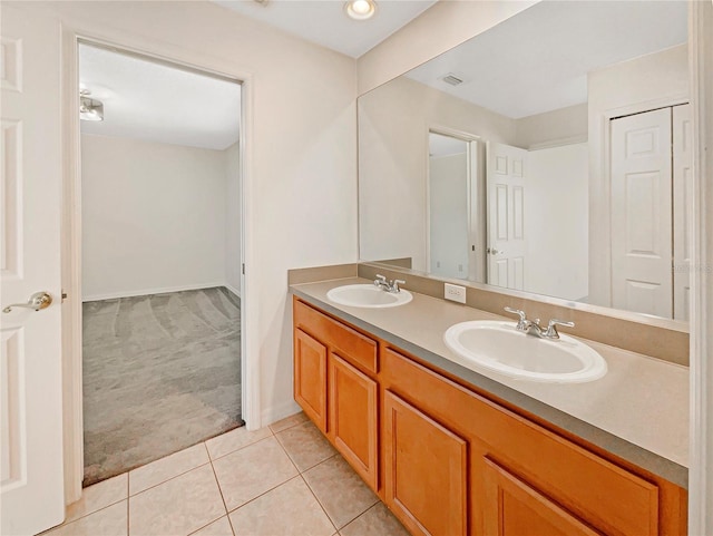 bathroom featuring tile patterned floors and vanity