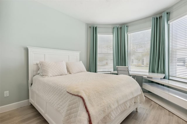 bedroom featuring light hardwood / wood-style flooring