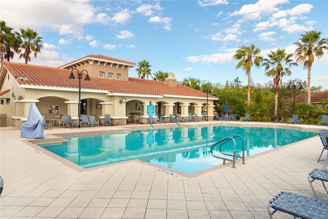 view of pool featuring a patio