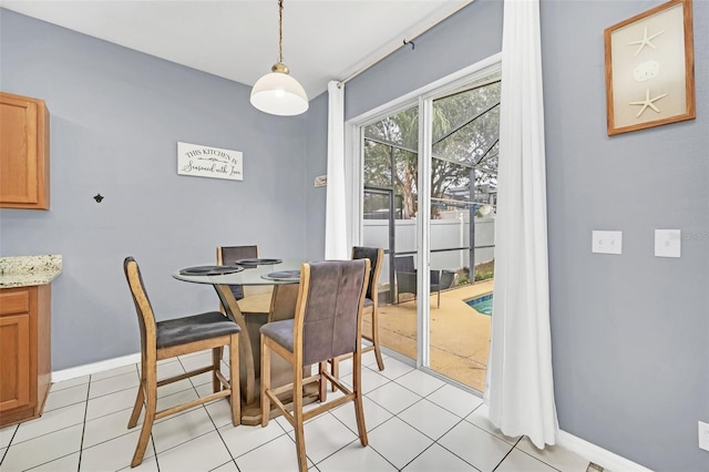 dining area featuring light tile patterned floors