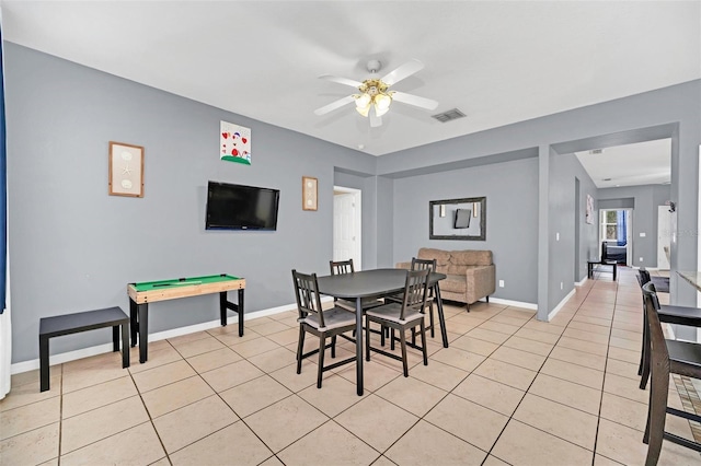 dining space featuring ceiling fan, light tile patterned flooring, and pool table