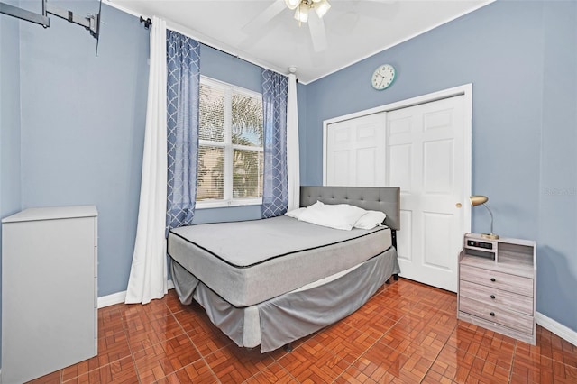 bedroom featuring a closet and ceiling fan