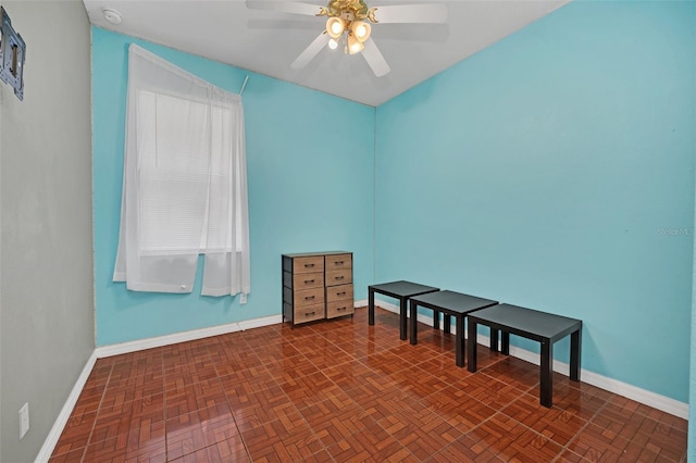 interior space featuring ceiling fan