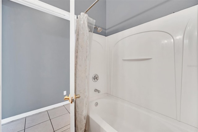 bathroom with shower / tub combo and tile patterned floors