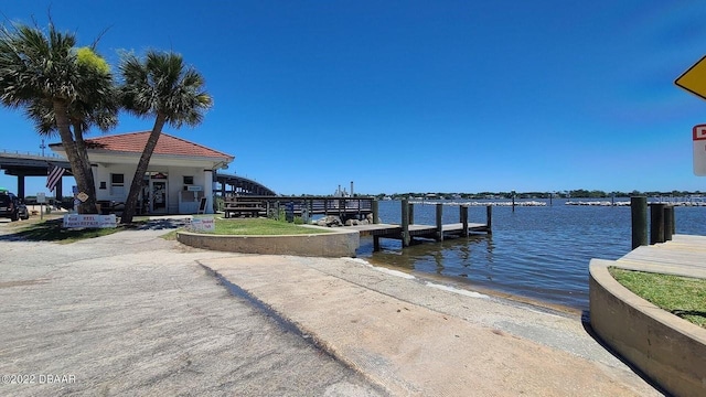 dock area featuring a water view