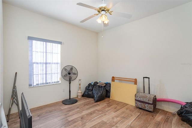 miscellaneous room with ceiling fan and light hardwood / wood-style floors