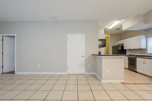 kitchen with black appliances, kitchen peninsula, sink, white cabinetry, and light tile patterned flooring