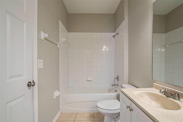 full bathroom with vanity, toilet, tile patterned floors, and tiled shower / bath