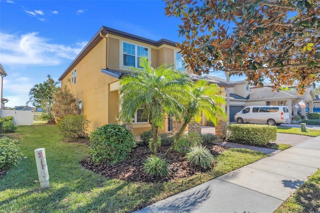 view of front of home featuring a front lawn