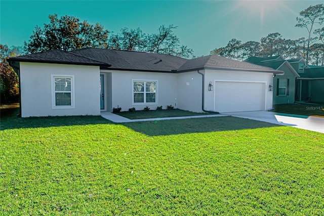 single story home with a garage and a front yard