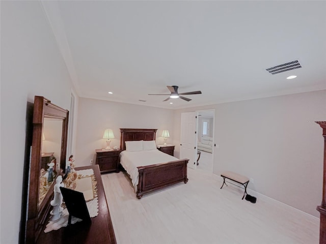 bedroom with ceiling fan and light wood-type flooring