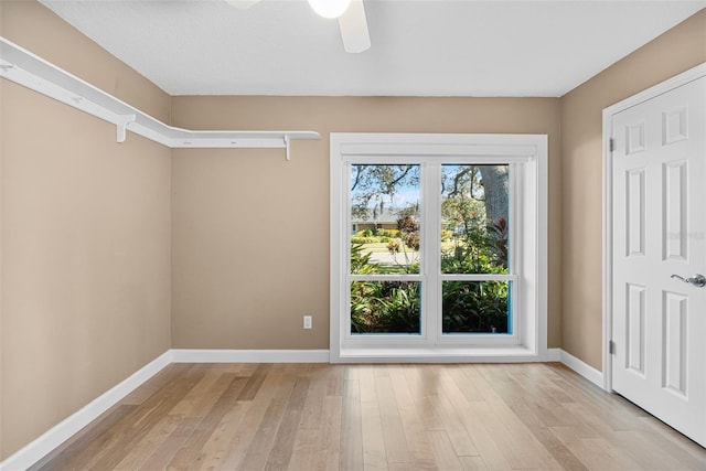 interior space with ceiling fan and light hardwood / wood-style floors