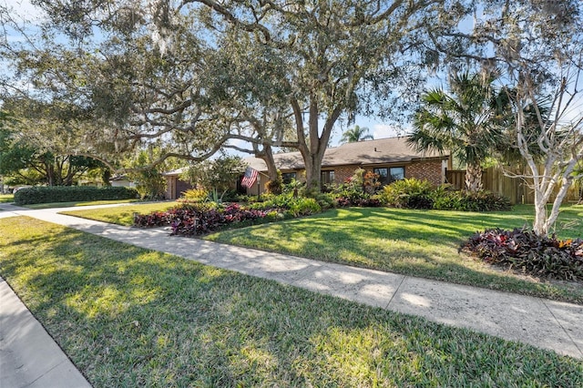 view of front of property with a front lawn