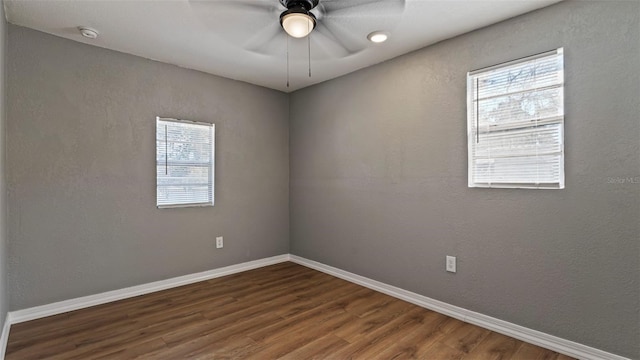 empty room featuring hardwood / wood-style floors