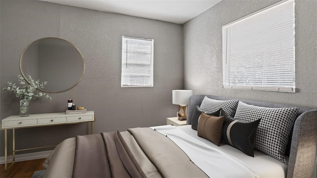 bedroom featuring hardwood / wood-style floors