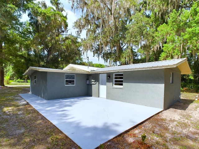 exterior space with a patio area