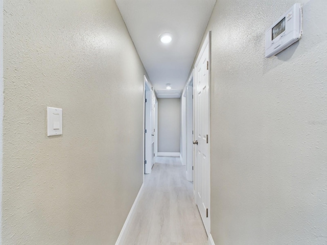 hall featuring light wood-type flooring