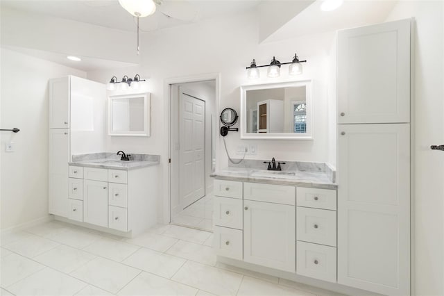 bathroom with vanity and ceiling fan