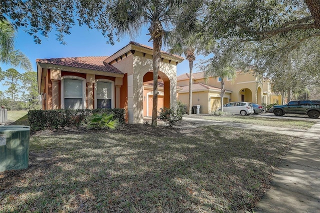 mediterranean / spanish home with central AC unit