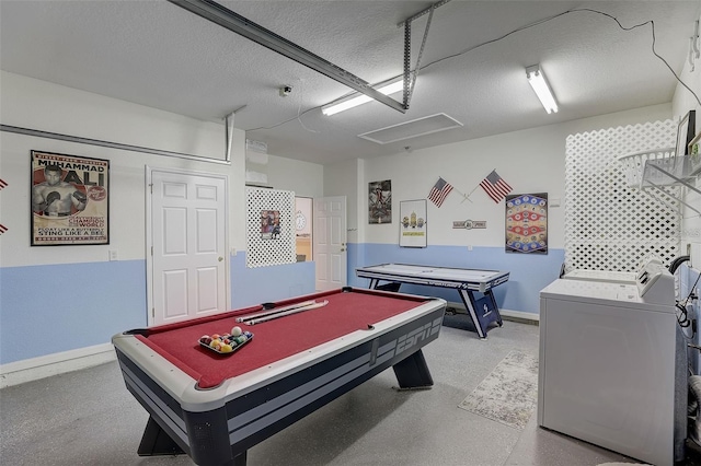 playroom with independent washer and dryer, a textured ceiling, and billiards