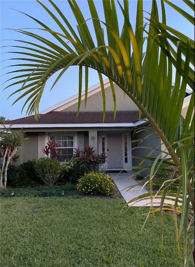 exterior space featuring a front lawn