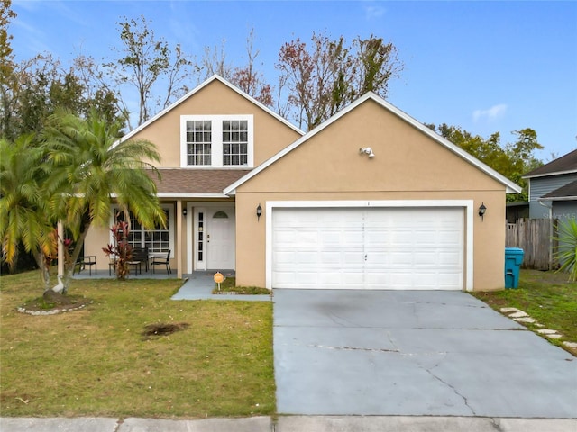 front facade featuring a front yard and a garage