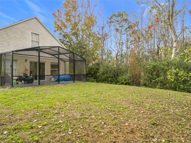 view of yard featuring a lanai