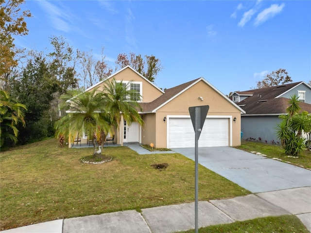 view of front of house featuring a garage and a front yard