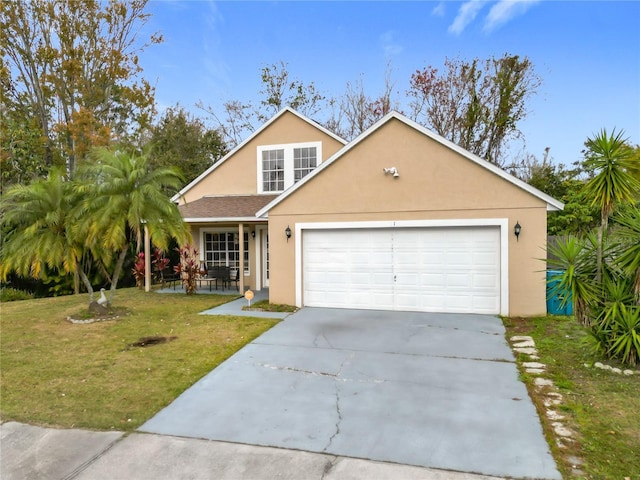 front facade featuring a garage and a front lawn