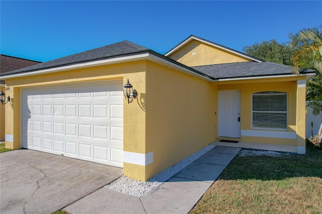 single story home with a garage