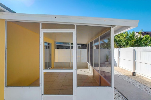 view of patio / terrace with a sunroom